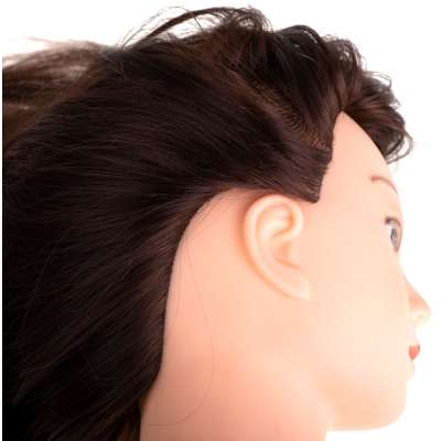 Hairdresser's training head with natural hair