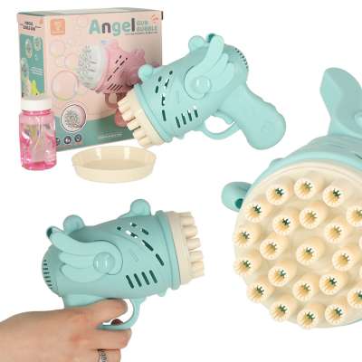 Soap bubble gun soap bubbles with wings blue