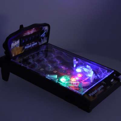 Pinball flipper table arcade game with lights and music