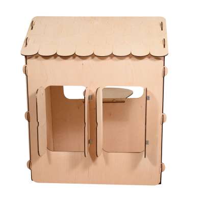 Wooden house for children with a board and table