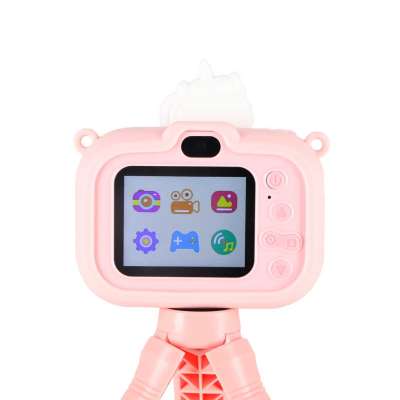 Digital camera for kids on tripod unicorn pink