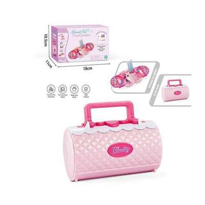 Makeup products nail polish and nail art supplies in a case