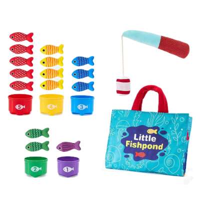 Arcade game fishing for stuffed fish cups and a mat